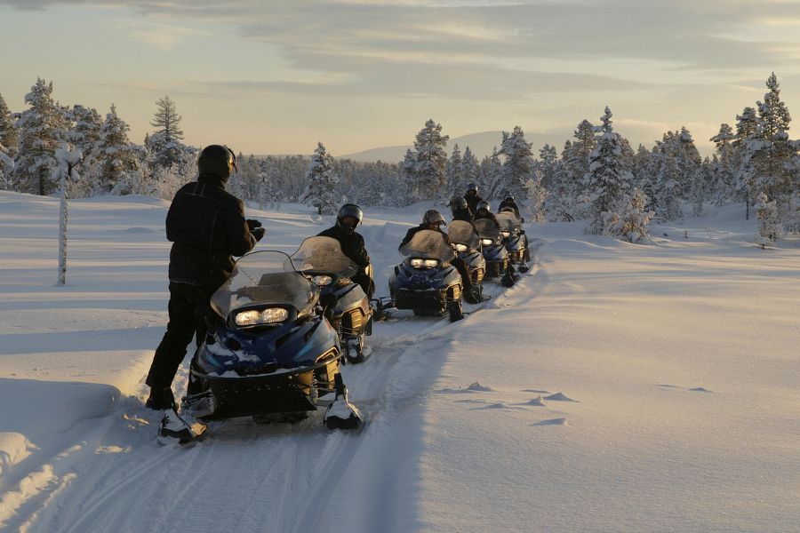 image shows a snowmobile tour