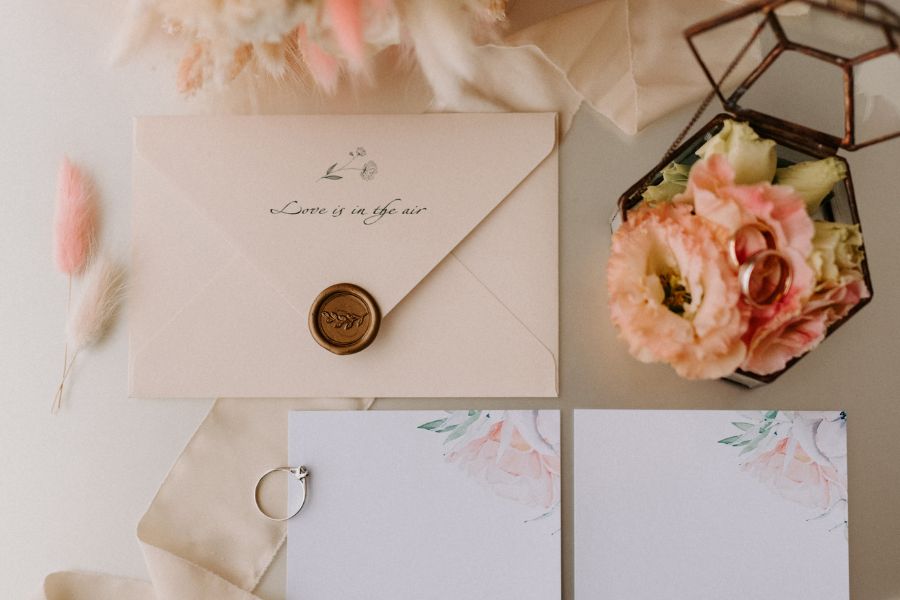 Image shows invitations and flowers